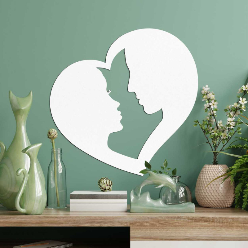 Srdeční tvar dekorace, ve kterém jsou propojeny kontury dvou tváří.